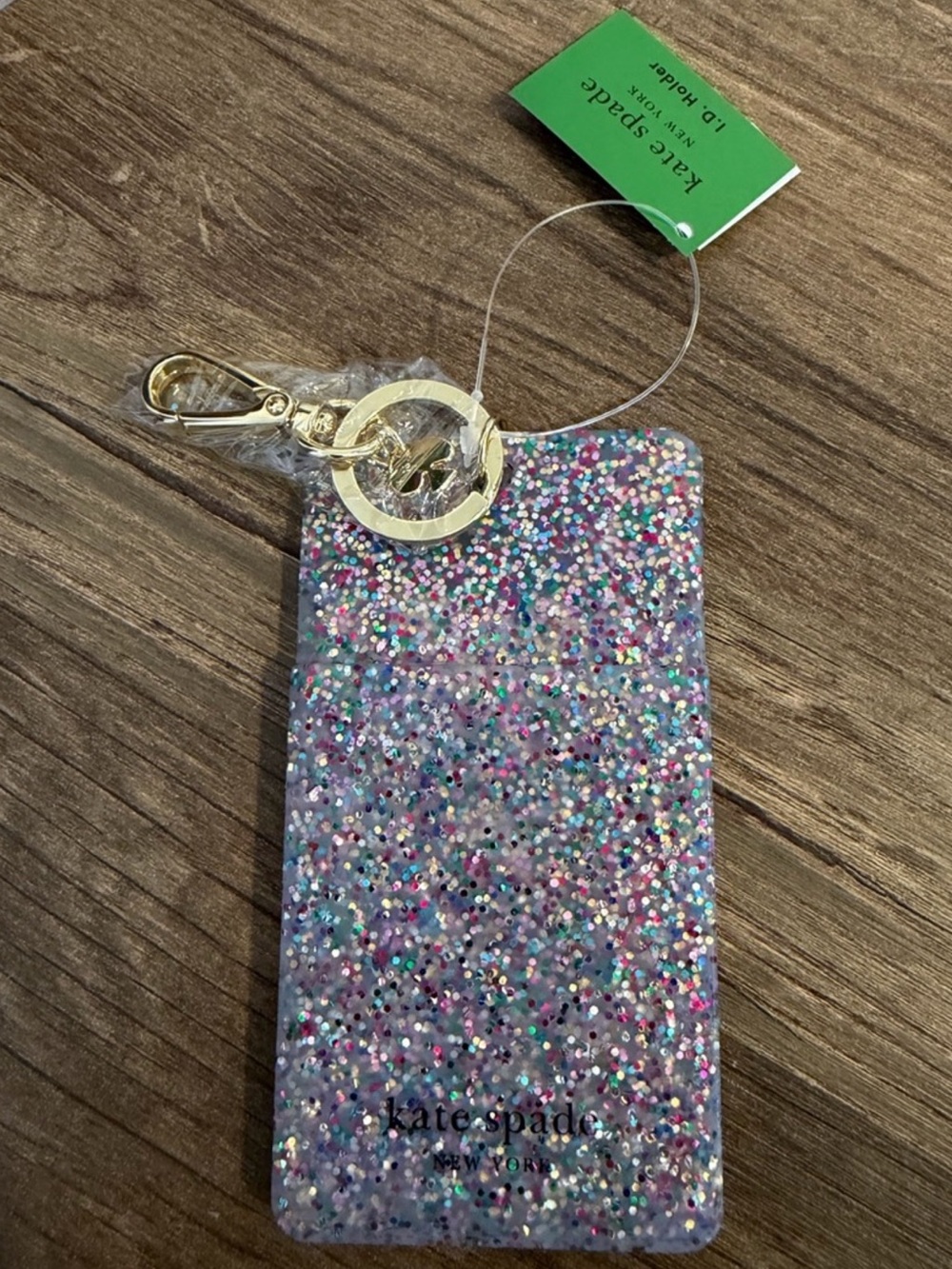 kate spade purple multi glitter ID badge holder with gold hardware